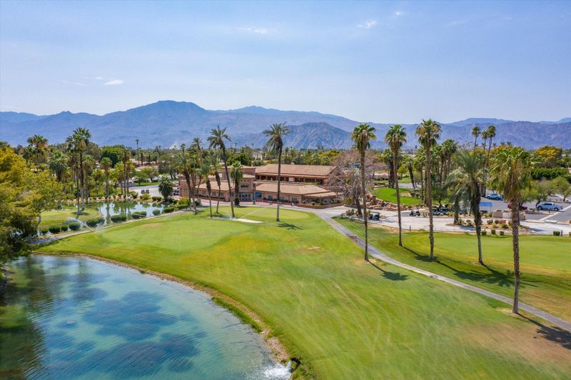 Indian Palms Country Club golf course with lake and mountain views